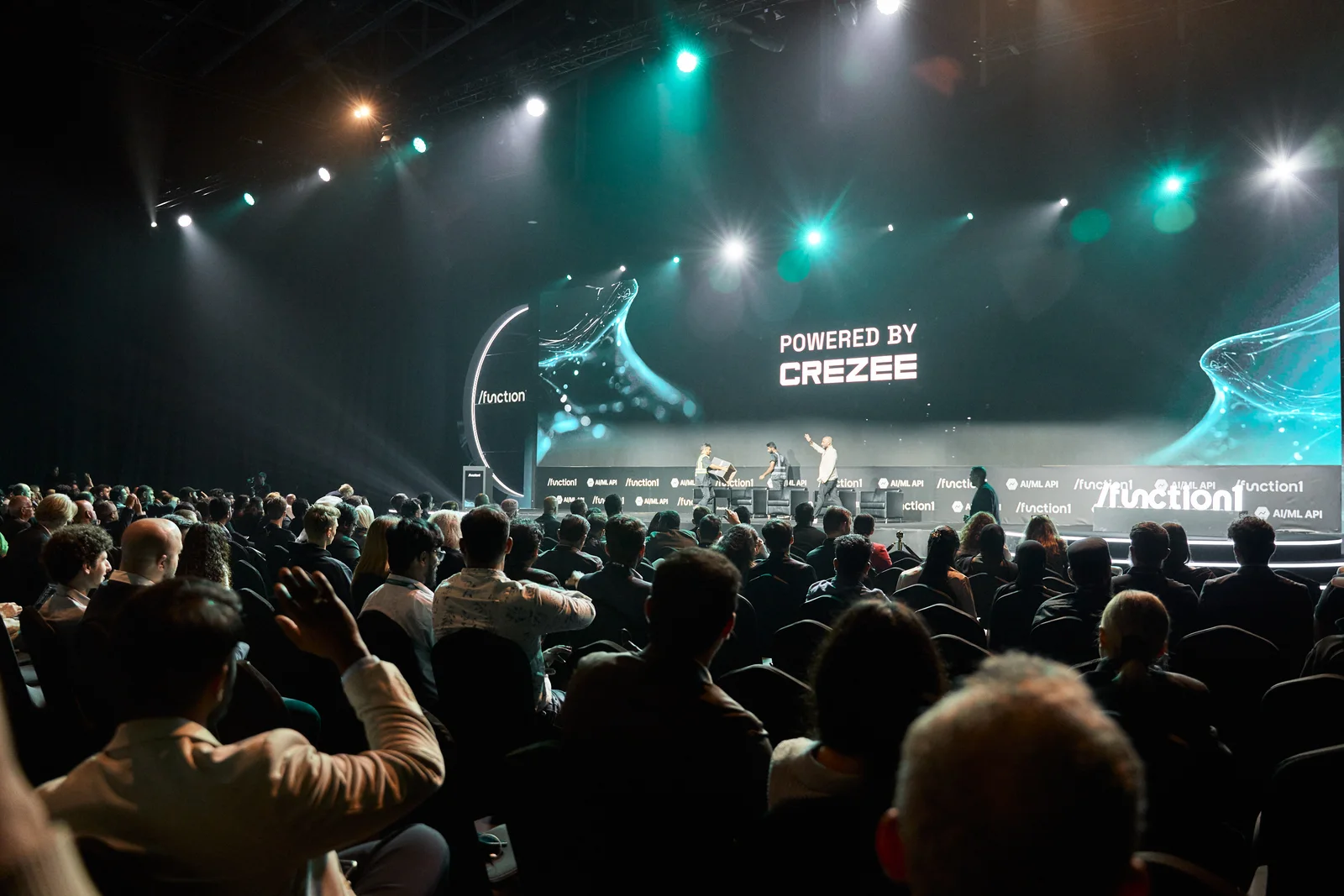 Jonathan Foltz speaking on a conference stage in front of an audience